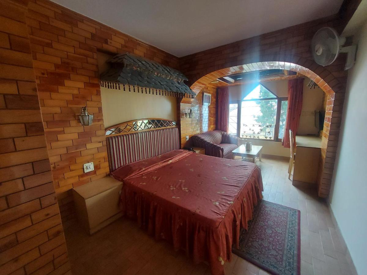 Brightland Hotel Шимла Экстерьер фото