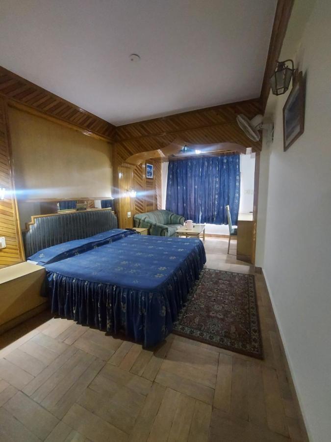 Brightland Hotel Шимла Экстерьер фото