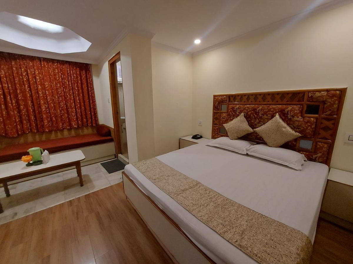 Brightland Hotel Шимла Экстерьер фото