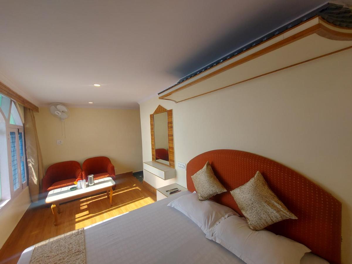 Brightland Hotel Шимла Экстерьер фото